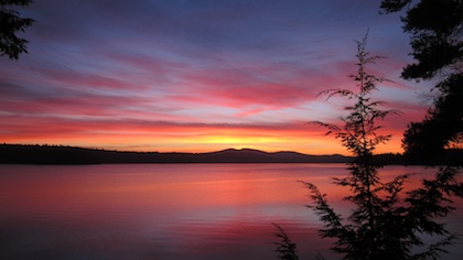 photo of sunrise over lake
