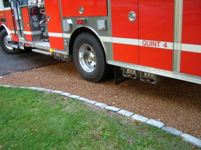 With proper installation, your home tar and chip driveway can stand up to the weight of a fire engine. PHOTO CREDIT: Tim Carter
