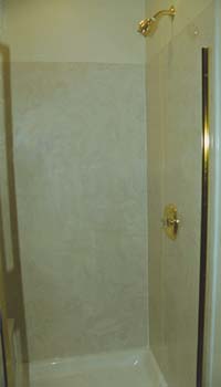 How do you clean cultured marble shower walls?