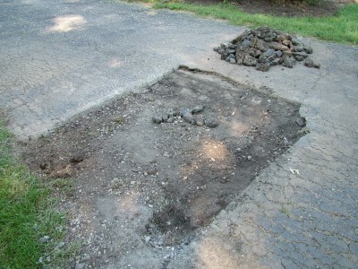 blacktop driveway needing patching