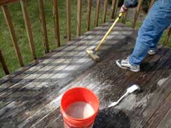 scrubbing a wood deck with Stain Solver