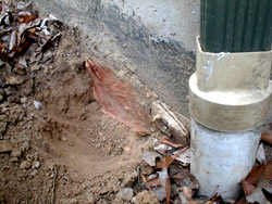 waterproofing on concrete foundation protected by stiff fiberglass