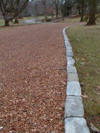 Tar & Chip Drive with Cobblestone Edging