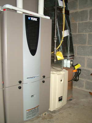 Installing a furnace requires great skill, specialized tools and experience. This ultra-high-efficiency York furnace with a gas modulating valve took Richard Anderson, the BEST HVAC craftsman in greater Cincinnati, OH, several days to install. PHOTO CREDIT: Tim Carter