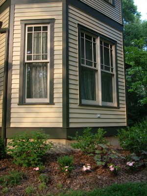 These windows may look original, but they are indeed replacement windows. Match the right windows with a great installer who is a craftsman, and you can fool anyone. PHOTO CREDIT: Tim Carter