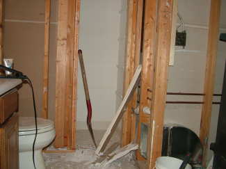 The demolition work in this bathroom can happen in stages to minimize the loss of use of the toilet and sink. PHOTO CREDIT: Tim Carter