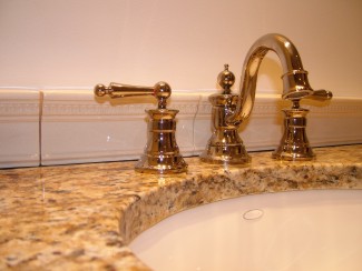 This tile backsplash was made with ornate cornice tiles, but installed in less than an hour. PHOTO CREDIT: Tim Carter 