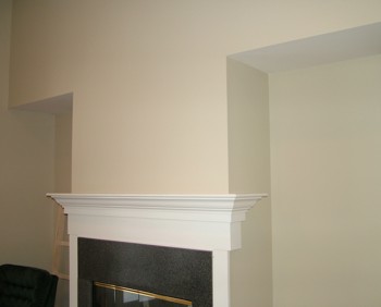 The alcoves on either side of the fireplace will soon have simple shelves. PHOTO CREDIT:  Tim Carter