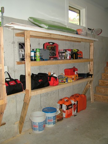 These heavy-duty storage shelves were made in several hours with a few sheets of plywood and some 2x4s. PHOTO CREDIT:  Tim Carter