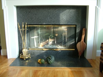 You can really jazz up your fireplace with functional and good-looking accessories. PHOTO CREDIT:  Tim Carter