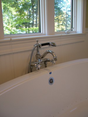 This Roman tub faucet has got plenty of class to compliment this comfortable soaking tub. PHOTO CREDIT:  Tim Carter