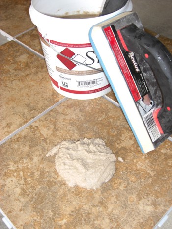 Yes, the urethane grout is premixed and comes in a bucket ready to go! PHOTO CREDIT:  Tim Carter
