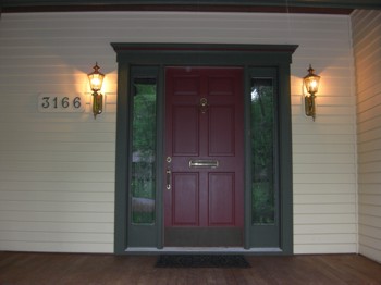 These two outdoor sconces are sized correctly and are at the right height off the porch floor. PHOTO CREDIT: Tim Carter
