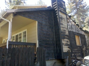 This home was saved from the valiant efforts of the firemen and internal fire sprinklers. PHOTO CREDIT:  Veronica Hill