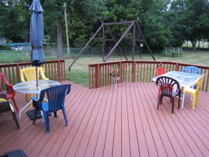 deck with table and chairs